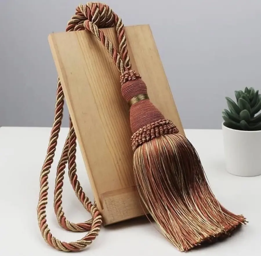 Copper-toned tassel tie-back