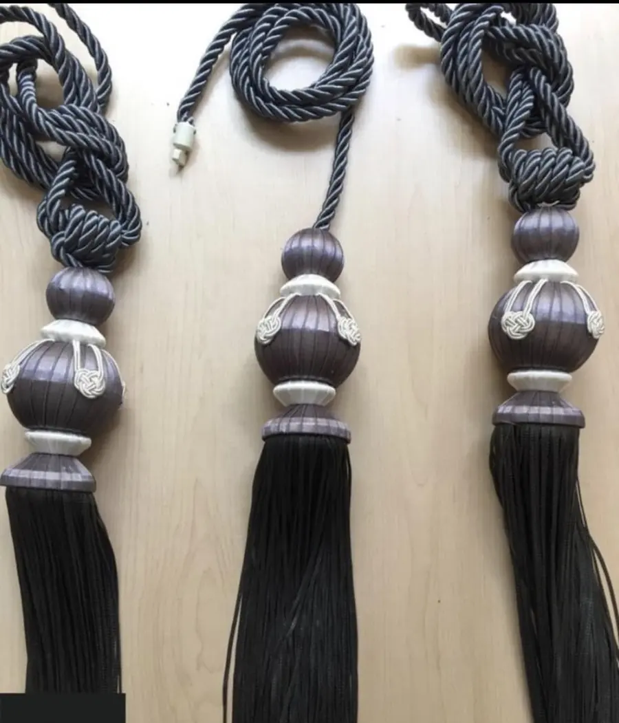 Grey and bronze tie-backs