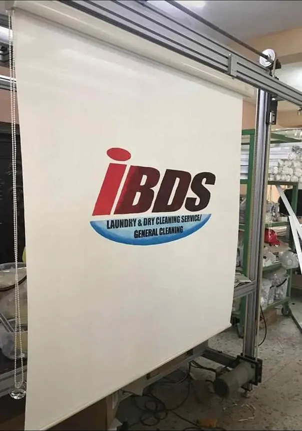 Laundry brand logo on a roller blind