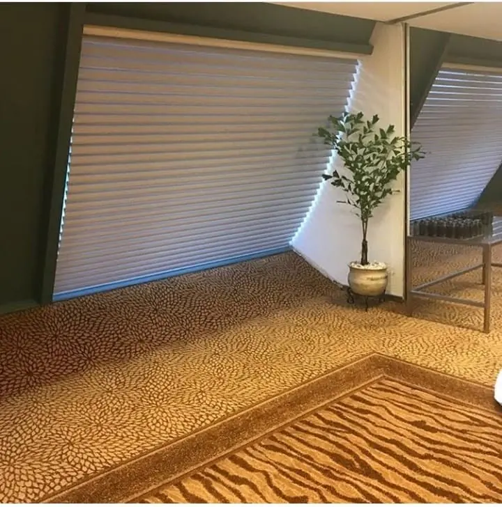 Large white blind in a lounge